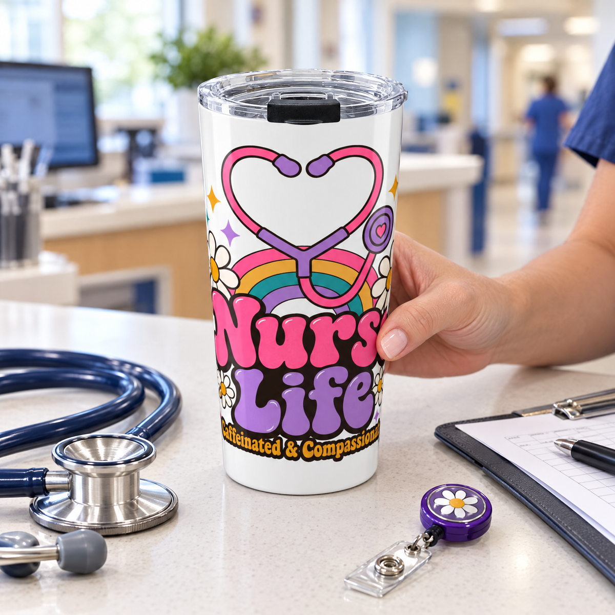 Nurse Life 20oz tumbler on a hospital nurses' station with a stethoscope, badge reel and clipboard