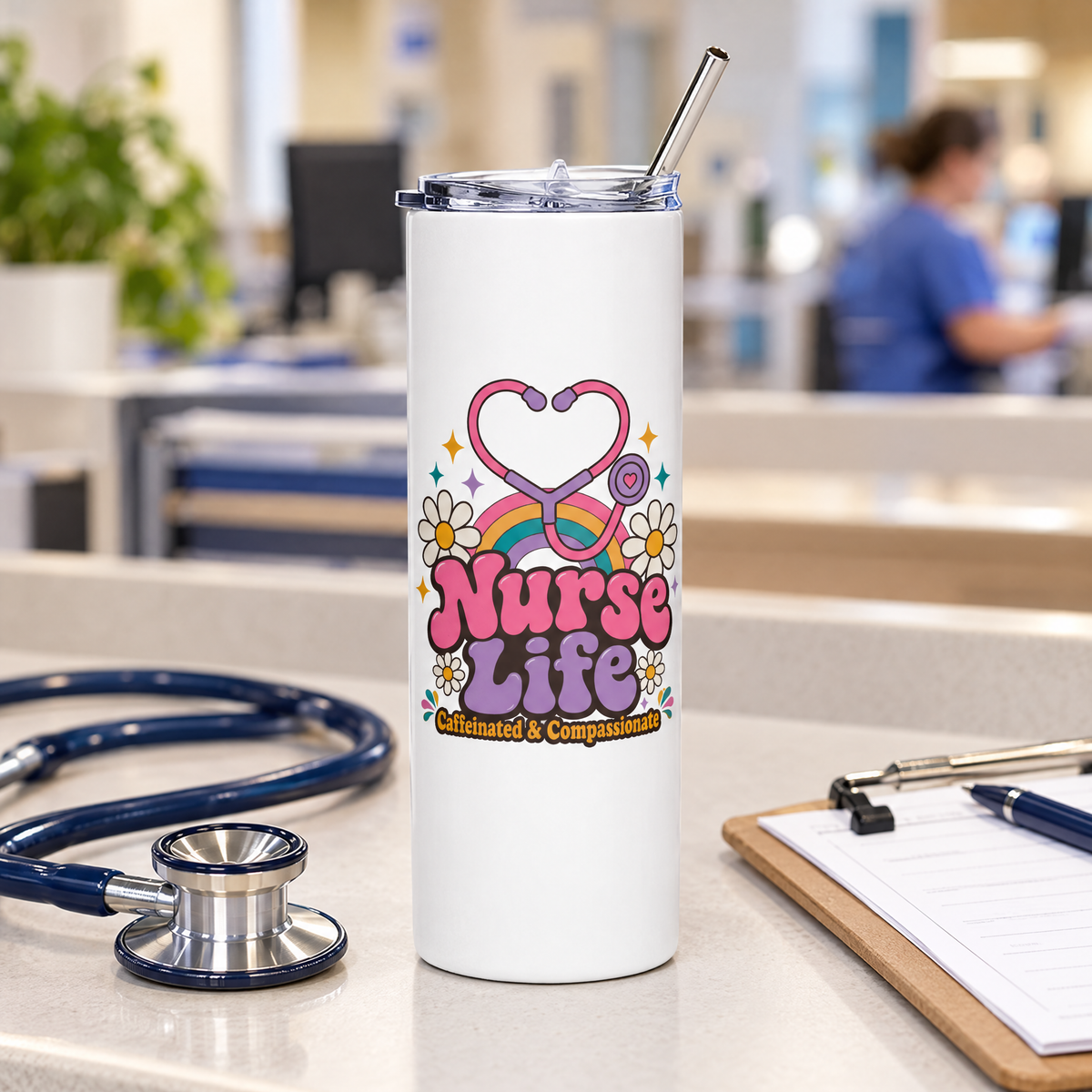 Nurse Life skinny straw tumbler on a nurses' station desk beside a stethoscope and clipboard