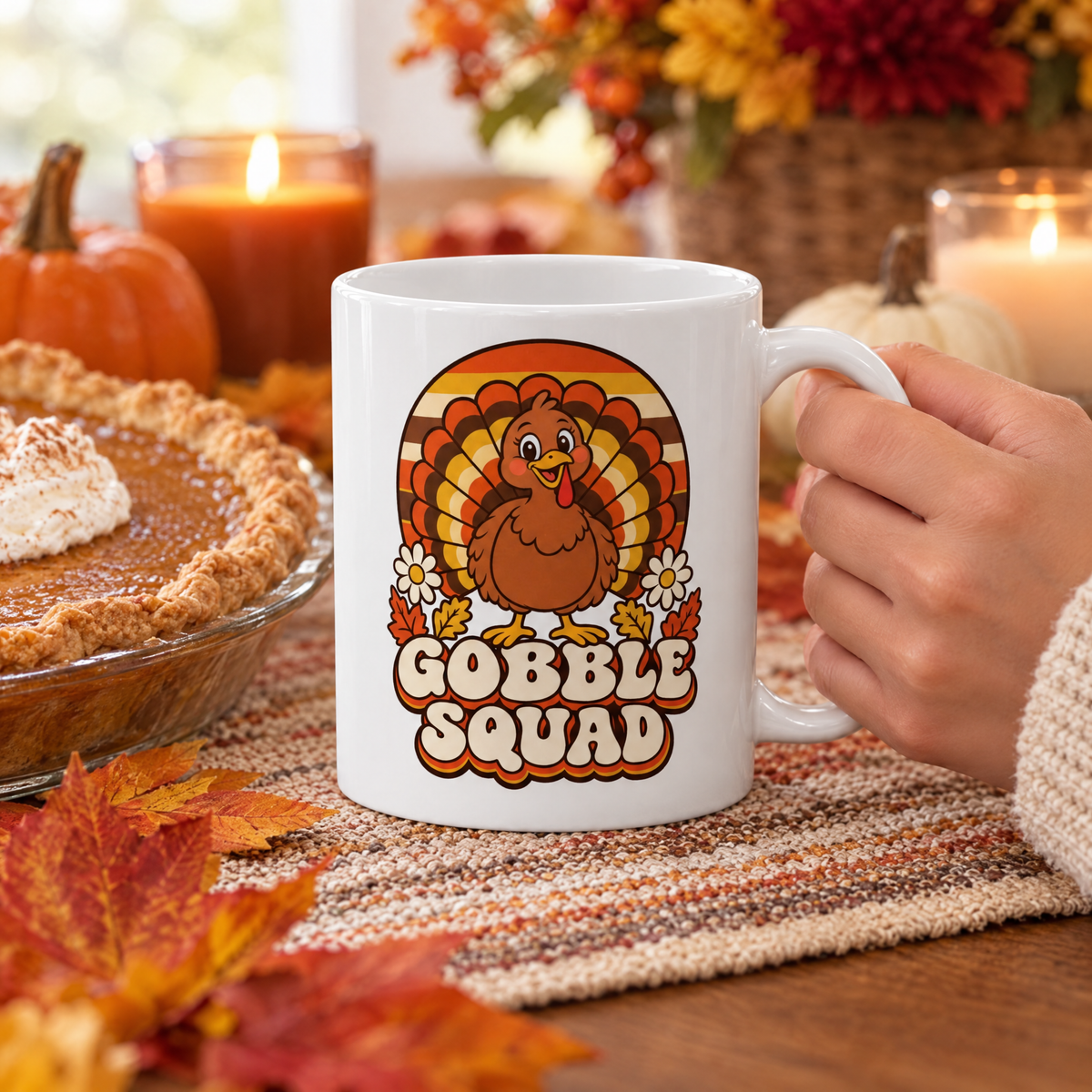 Gobble Squad mug on a fall table runner with pumpkin pie and candles
